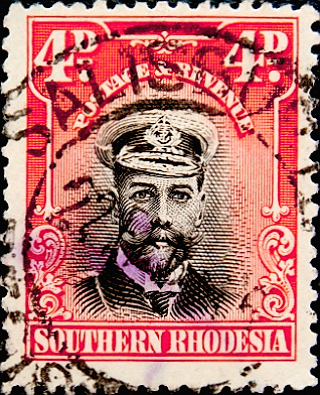 Родезия Южная 1924 год . Король Георг V в морской форме . 4 p . Каталог 5,0 €.